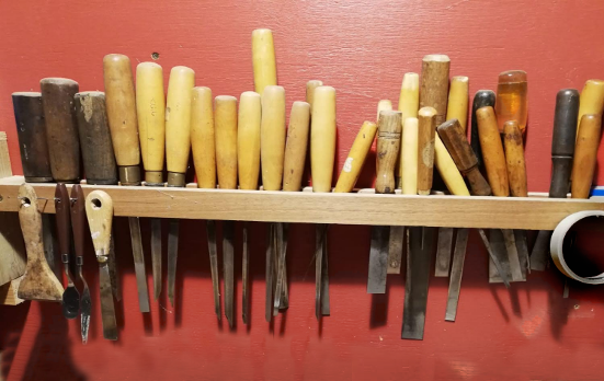 Wood Chisels in rack - furniture conservator tools